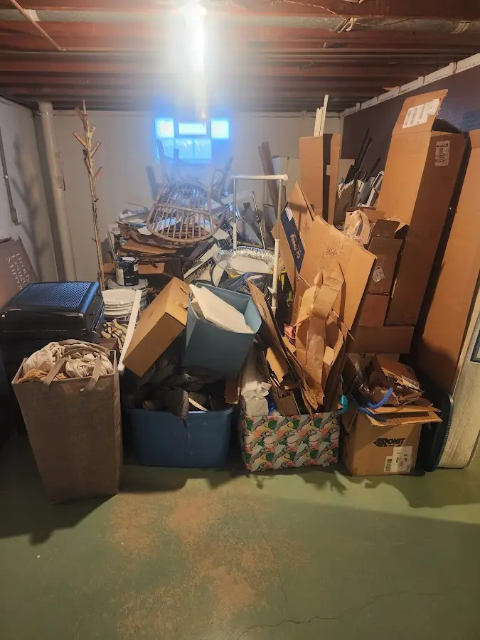 Roll-off dumpster container at job site for 8 Yard Dumpster Rental in Ormond-by-the-Sea